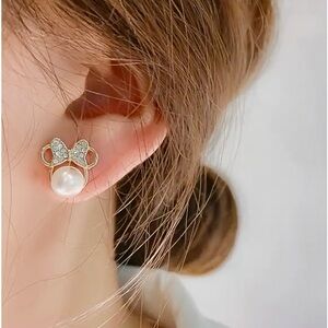 - Gold plated  earrings.